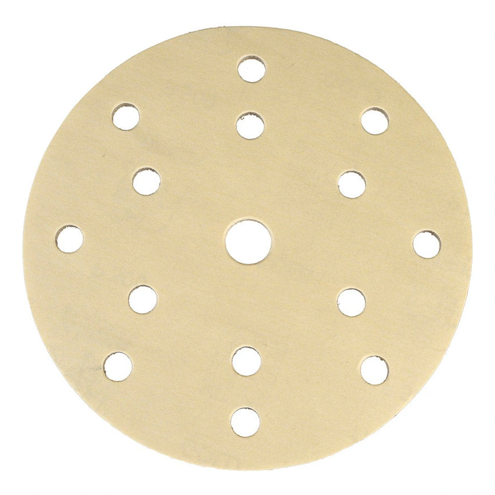 A light-colored round sanding disc with multiple holes, shown front-on