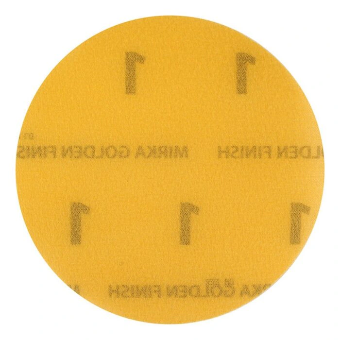A round yellow sanding disc with dark printed markings, shown front-on