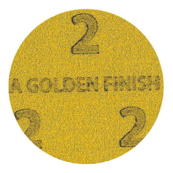 A round yellow disc with a dark abrasive surface and a large printed number