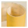 Close-up of a yellow-gray abrasive roll edge with a hollow core and visible
