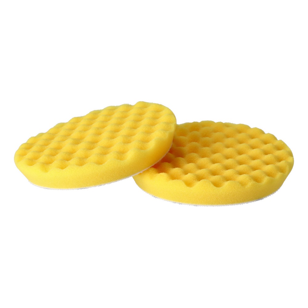 Two round yellow polishing pads with a waffle texture, placed side by side