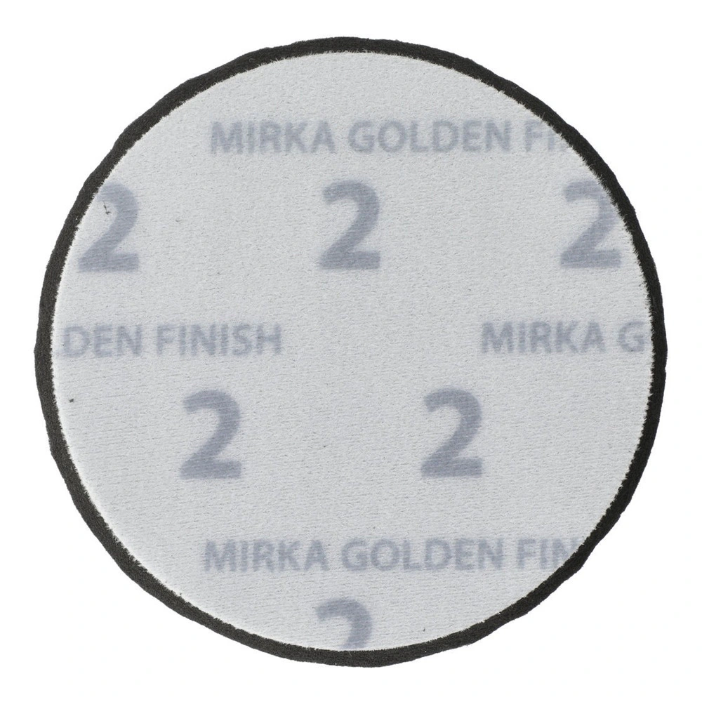 White round pad with gray text and black edge