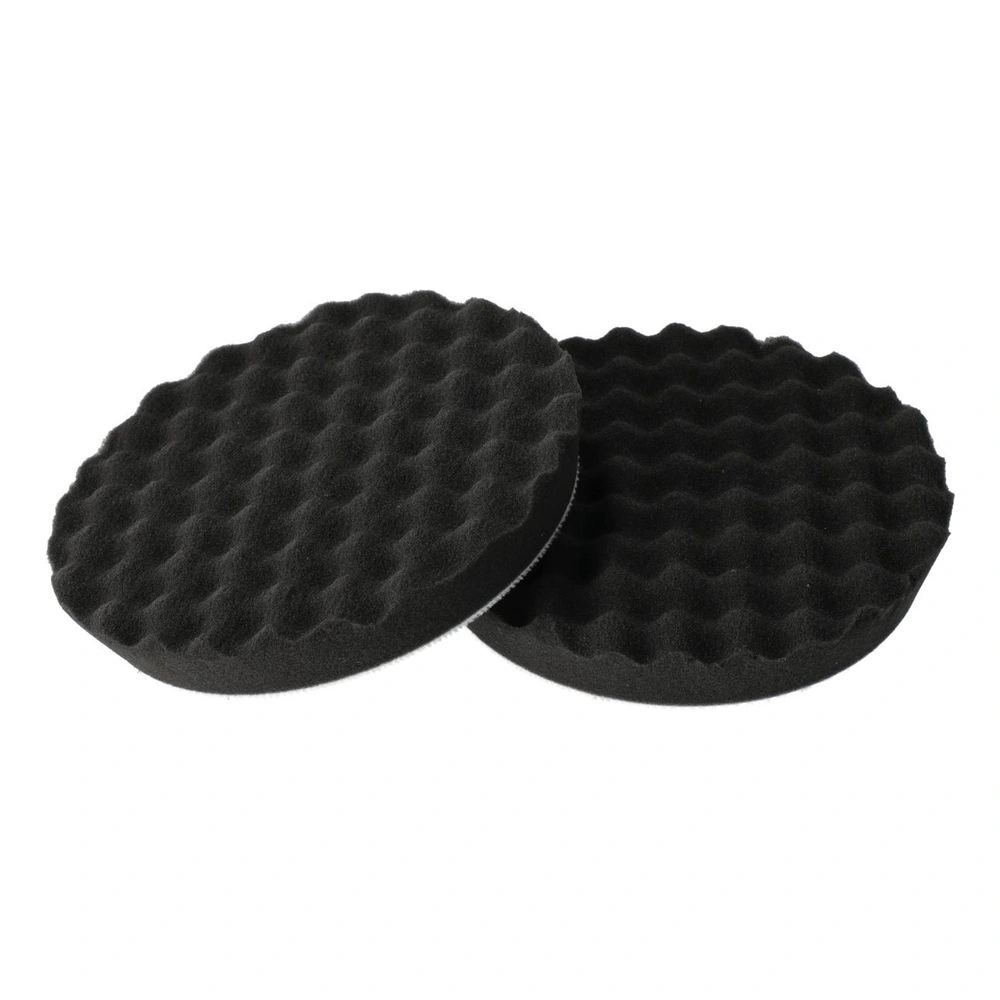 Two black round pads with waffle texture