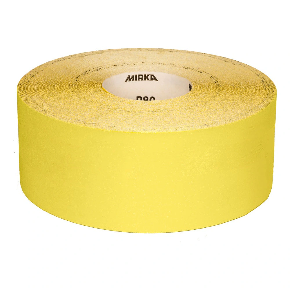 Rolled yellow sanding paper with a visible inner core