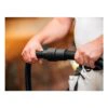 Person holding a suction hose with black connector