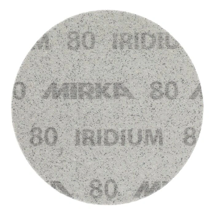 A round gray-white sanding disc with a speckled texture and printed