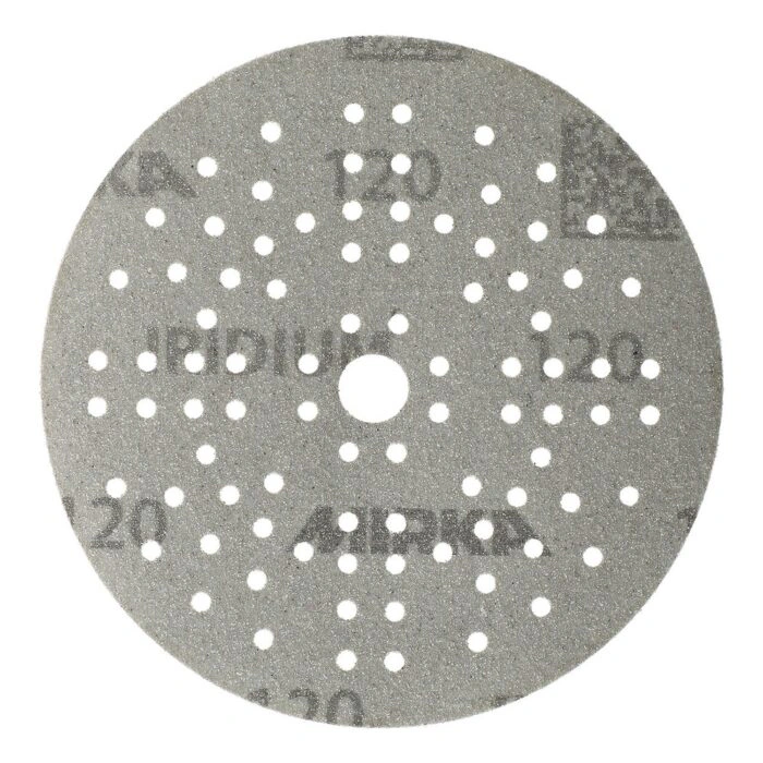 A round gray sanding disc with many holes around a central hole, including