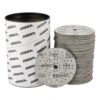 Branded cylindrical container beside a stack of sanding discs with one disc