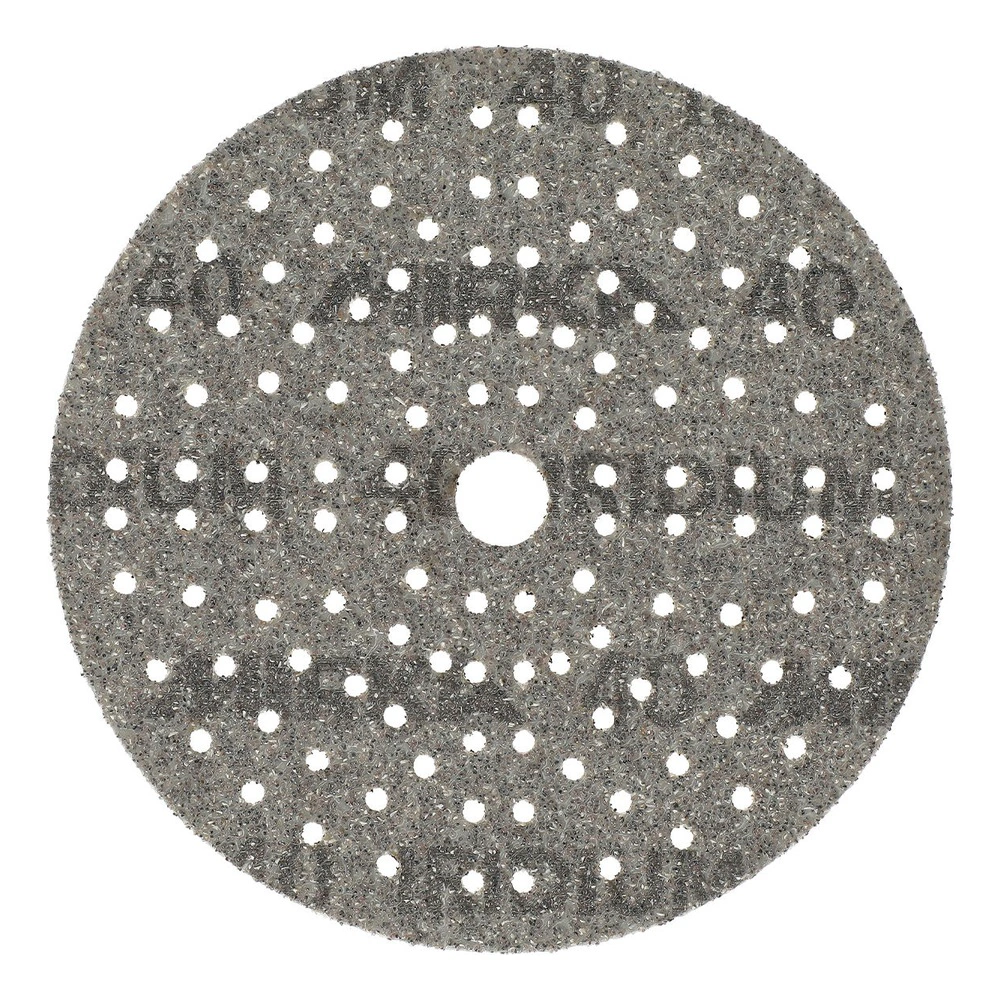 Gray circular sanding disc with many holes and a central hole on a white