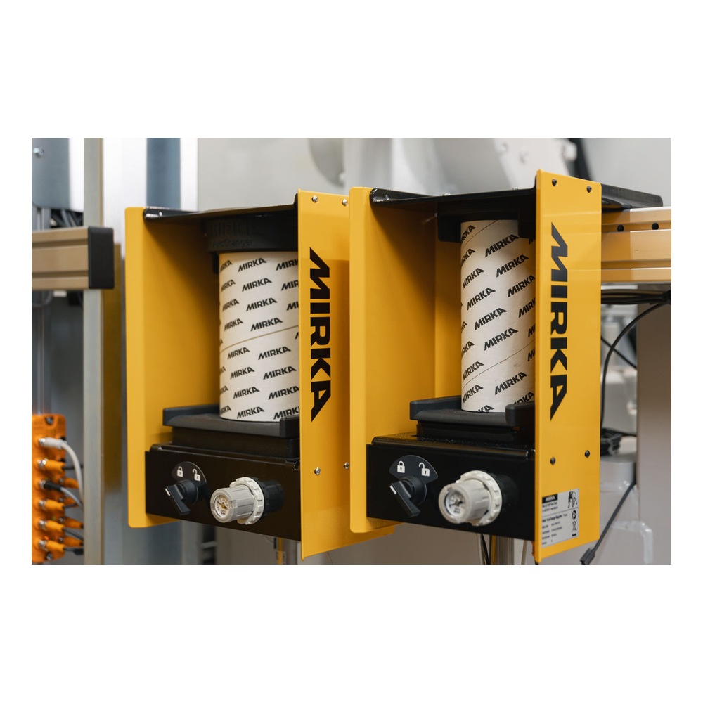 Two yellow units with rolls of gray Mirka-branded material, shown