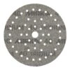 Dark gray round sanding disc with many holes and a rough textured surface