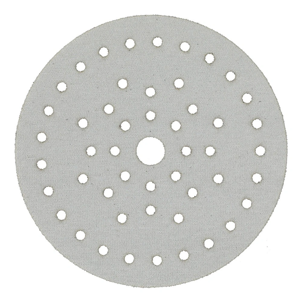 A round gray sanding disc with many holes and a central hole, shown
