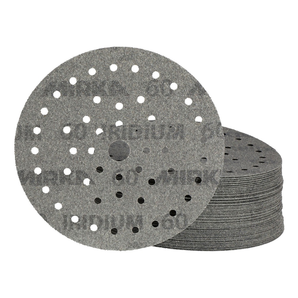 Two overlapping perforated sanding discs, with a stack of additional discs