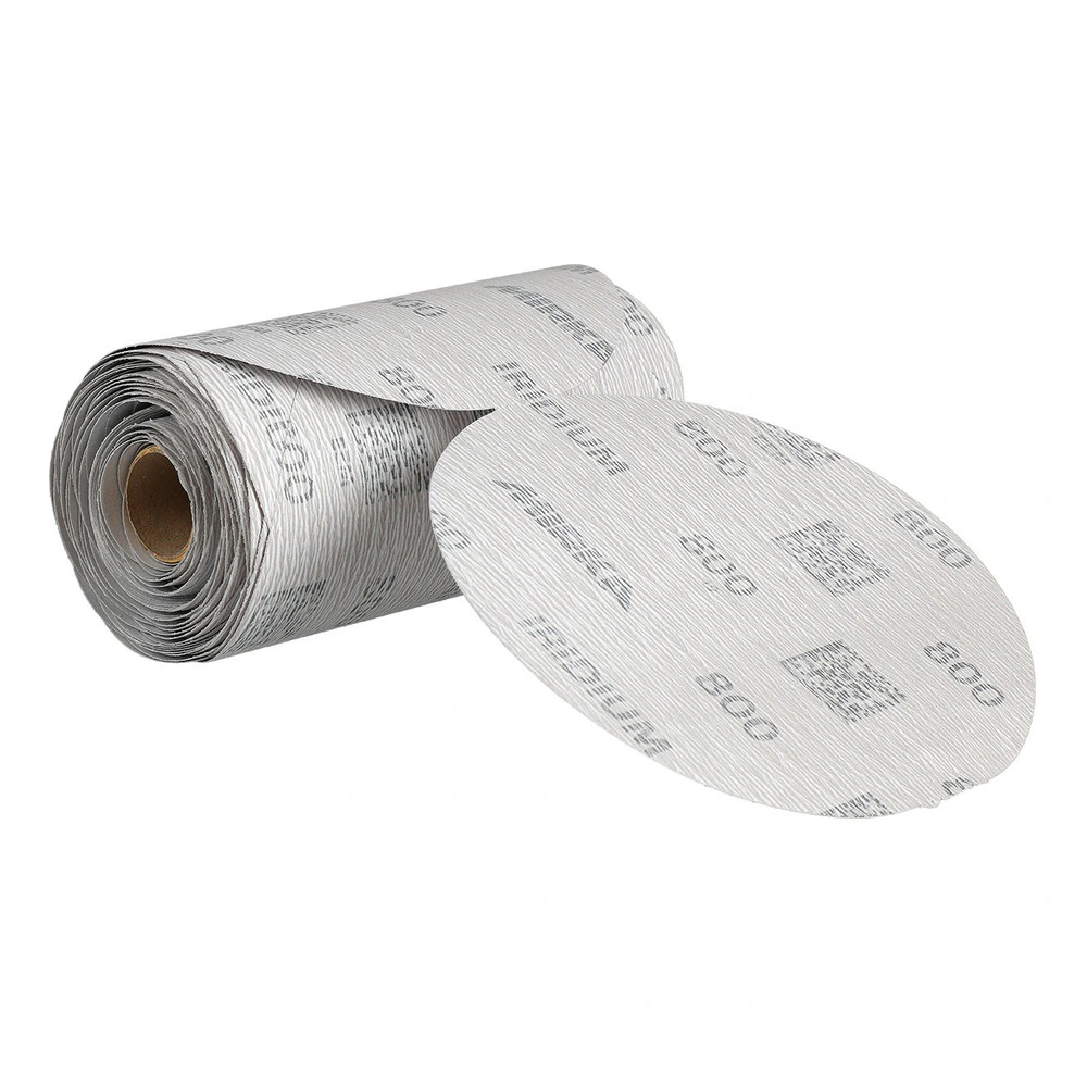 A roll of white-gray sanding sheets with printed markings, with one sheet