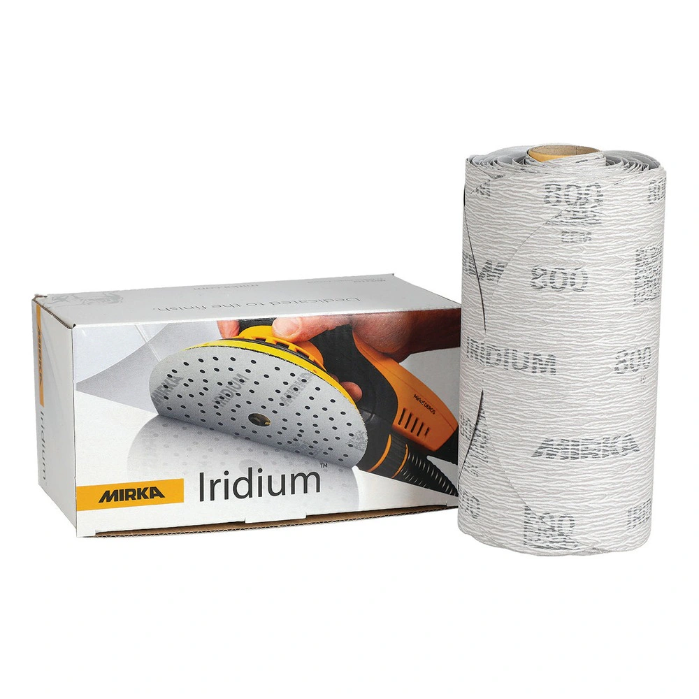 A box and a rolled stack of gray sanding discs with holes on a white