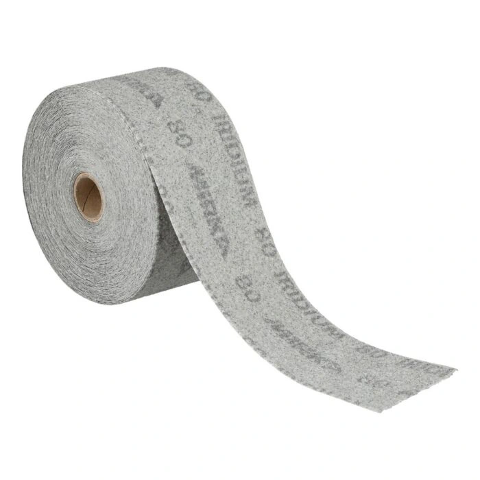 A rolled gray sanding paper roll with an open end hanging forward