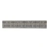 Gray perforated sanding strip, laid flat on white