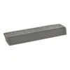 A stack of gray perforated sanding strips is shown at an angle on a white
