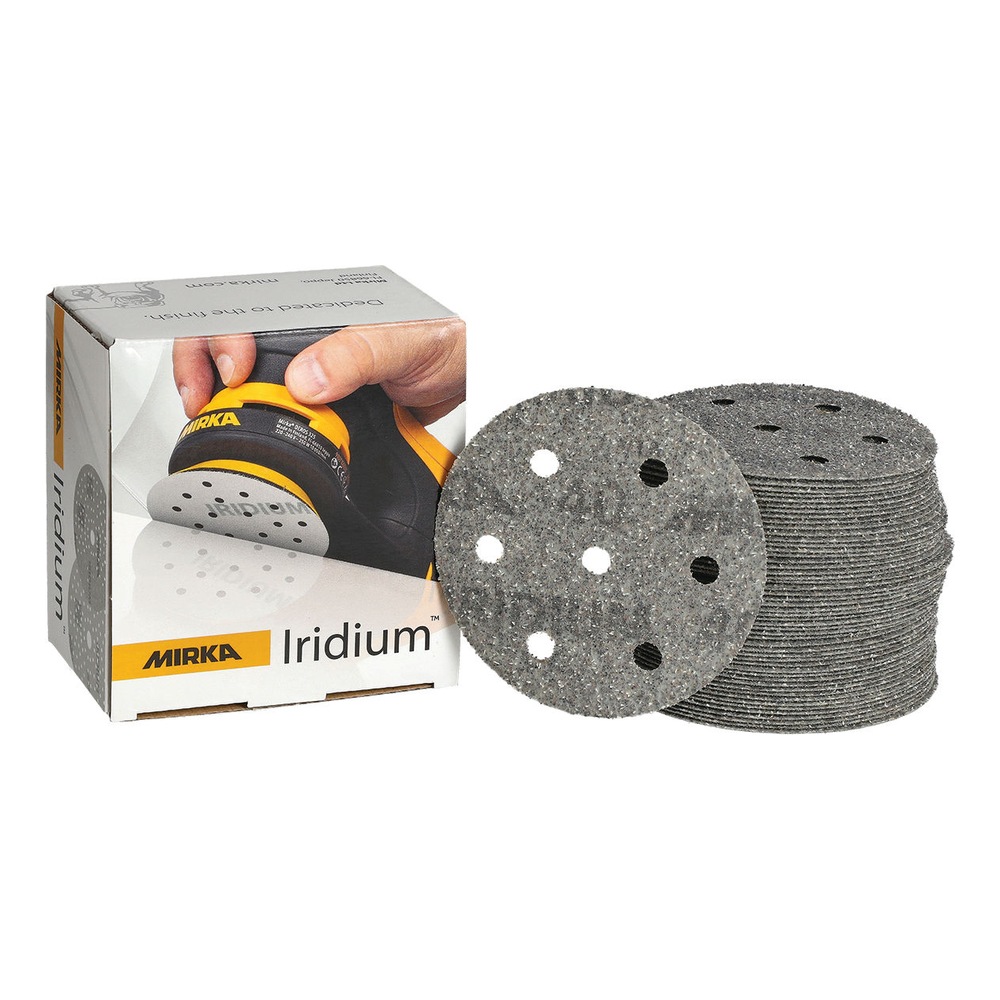 Product box with a stack of round sanding discs and one disc beside it, all