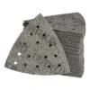 A stack of perforated triangular sanding sheets, with one sheet placed