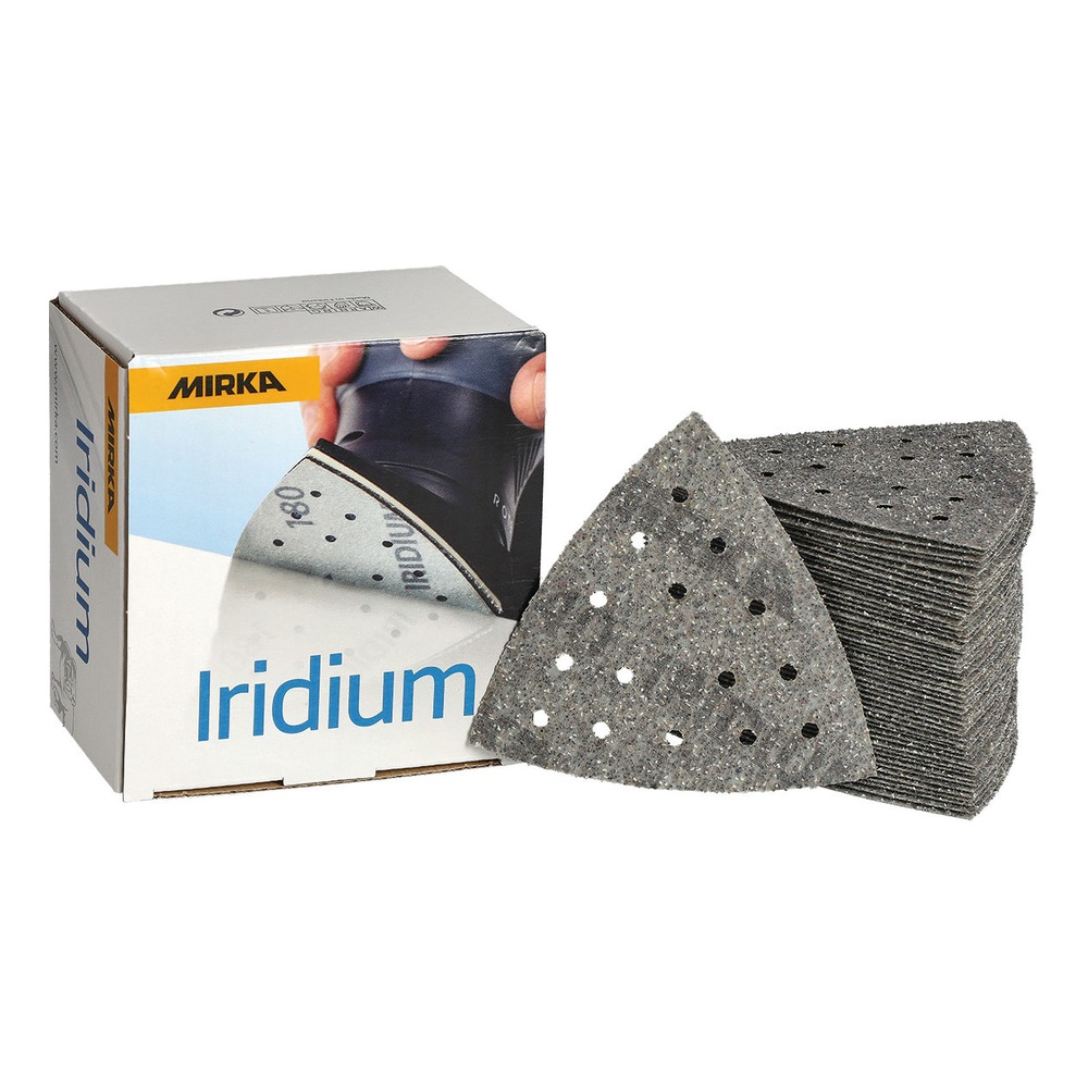 A Mirka box beside a stack of perforated triangular sanding sheets, with one