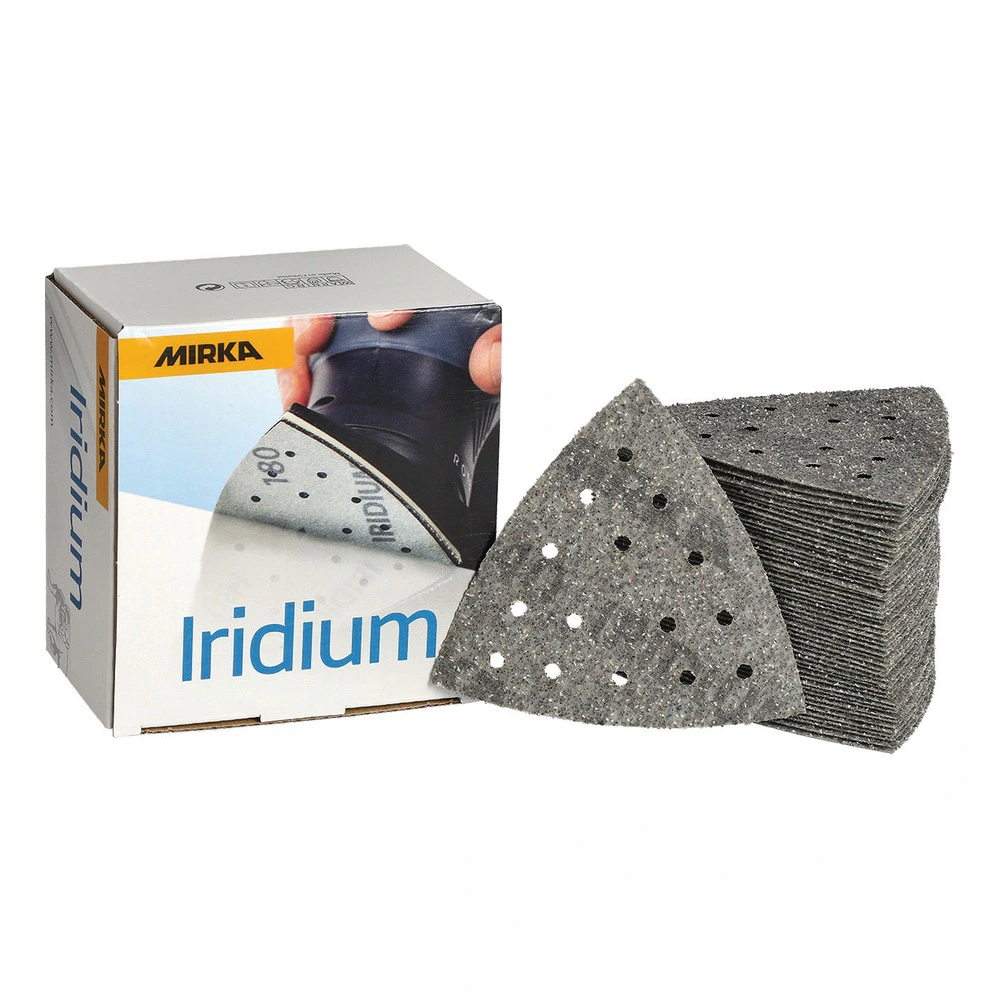 A Mirka box beside a stack of perforated triangular sanding sheets, with one