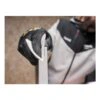 A person wearing a glove is holding a folded sanding sheet around the edge
