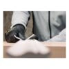 Person sanding a wooden board with sanding paper