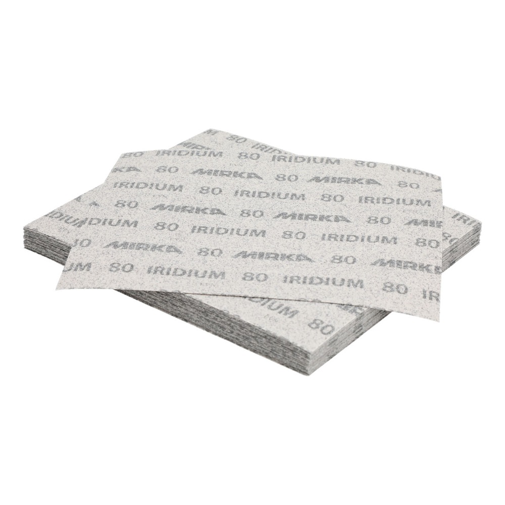 Stack of rectangular sanding sheets on white