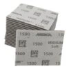 A stack of gray sanding sheets printed with 1500 and Mirka, shown as a pile