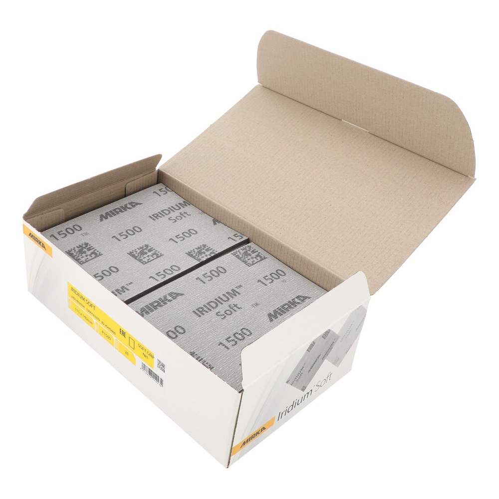 An open cardboard box containing a stack of gray sanding sheets, with yellow