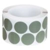 Roll of green round stickers on white