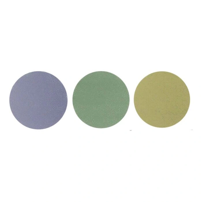 Three round sanding discs in different colors