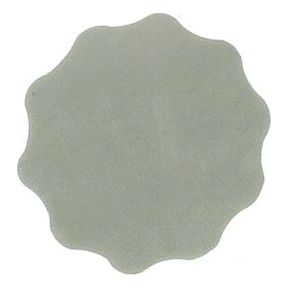 Close-up of a gray-green scalloped sanding rosette with a flower-like shape