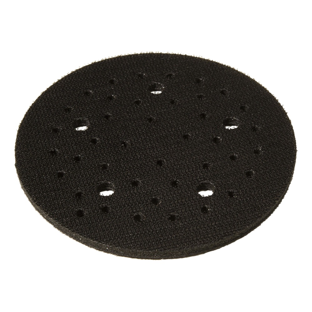 Black round pad with a slightly oval shape, small vent holes, and several