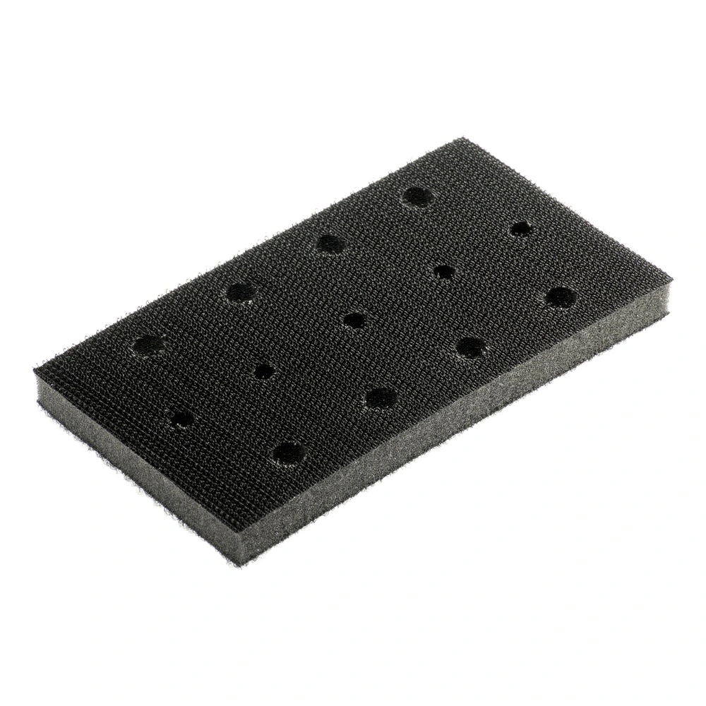 Black rectangular interface pad in an angled view, with six visible holes