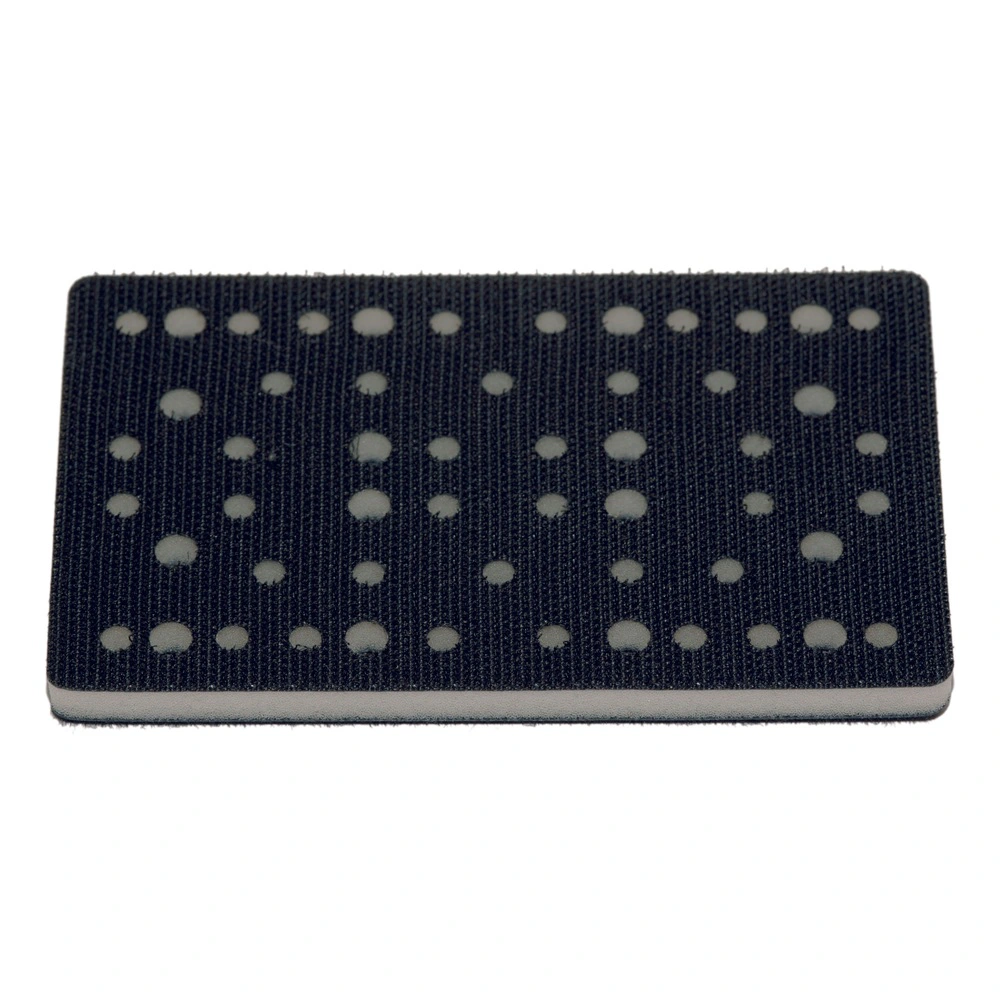 Black rectangular interface pad with a dense hole pattern, top view