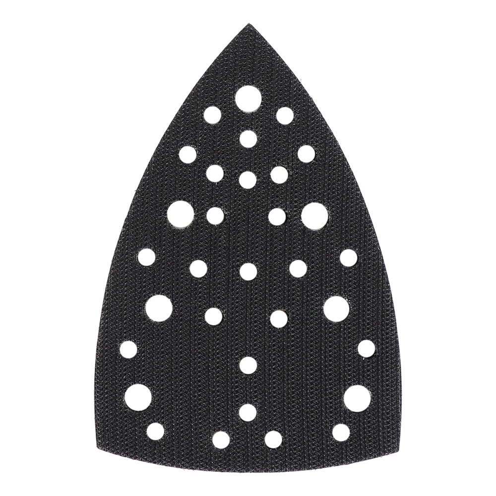 Black teardrop-shaped interface pad with holes on a white background