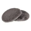 Two dark gray fluffy round pads, overlapping on a white background