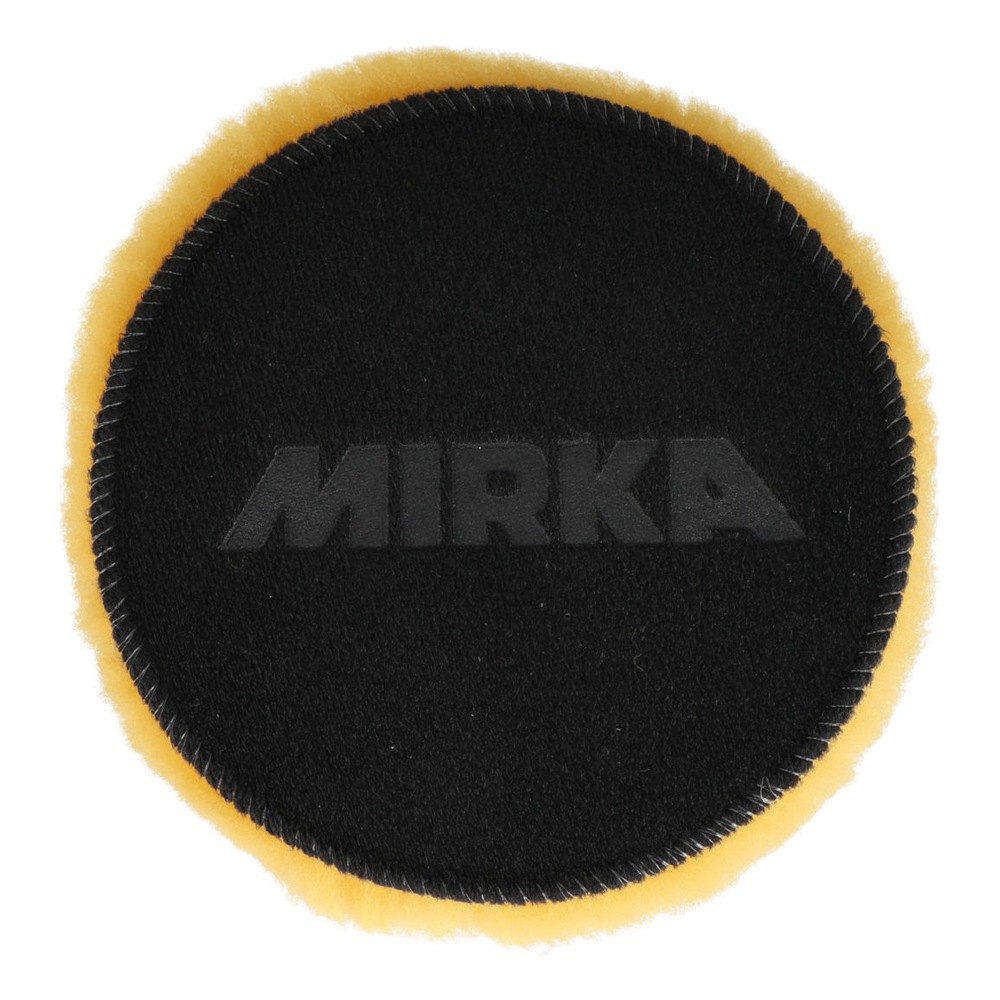 פד צמר עגול שחור עם שפה צהובה ולוגו MIRKA במרכז - Round black lambswool pad with a yellow edge and MIRKA logo in the center