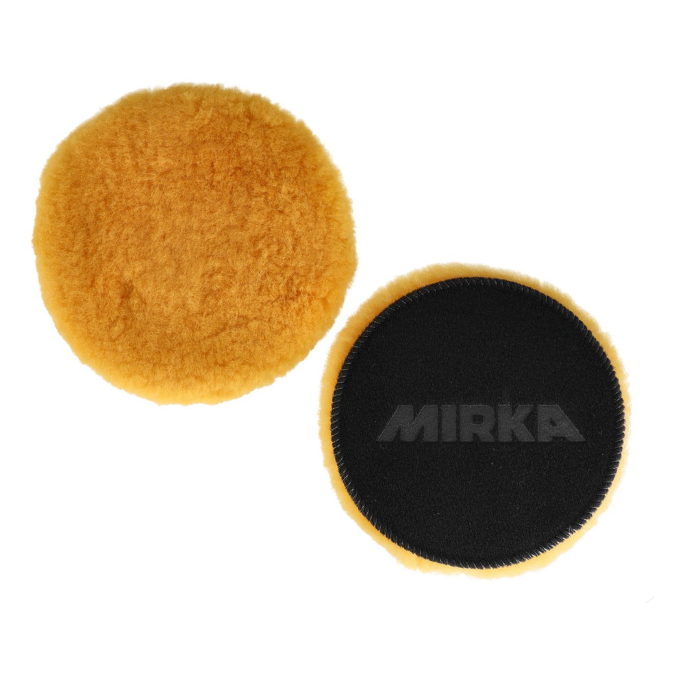 Two yellow-orange round pads, one showing the fluffy side and one showing