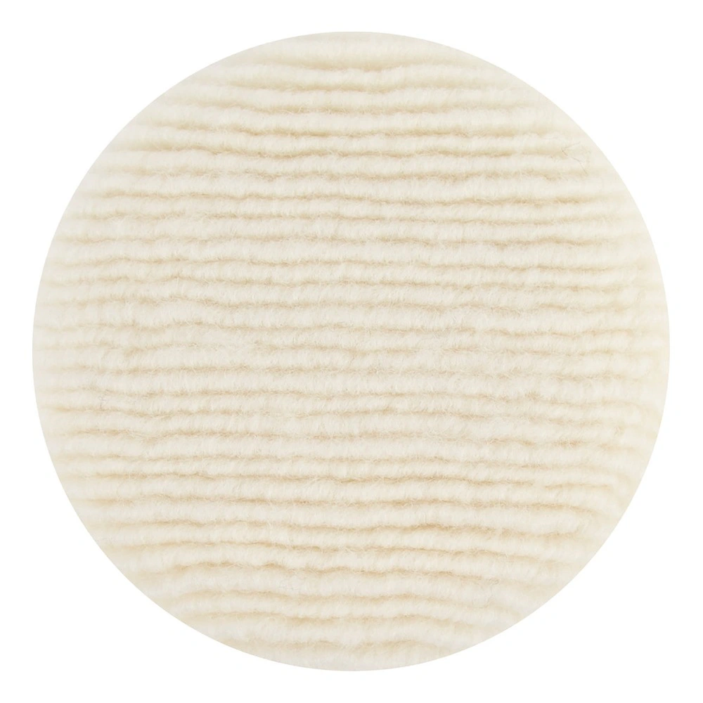 Round white wool pad, dense ribbed texture