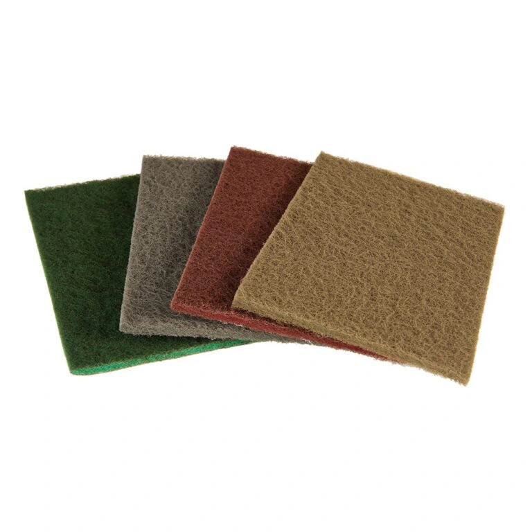 Four rectangular nonwoven sanding pads