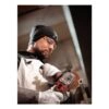 Person using angle grinder with eye protection