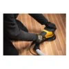 Person using a sander on a wood surface