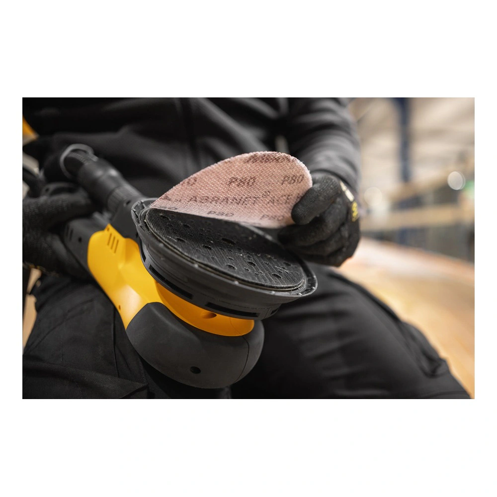 Handheld sander with sanding disc held up