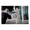 Person cutting concrete blocks with angle grinder