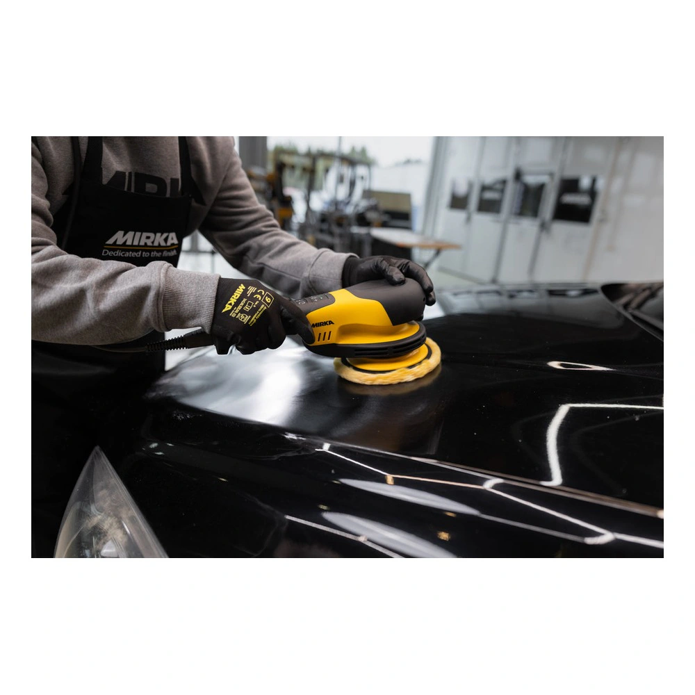 Person polishing a black car surface