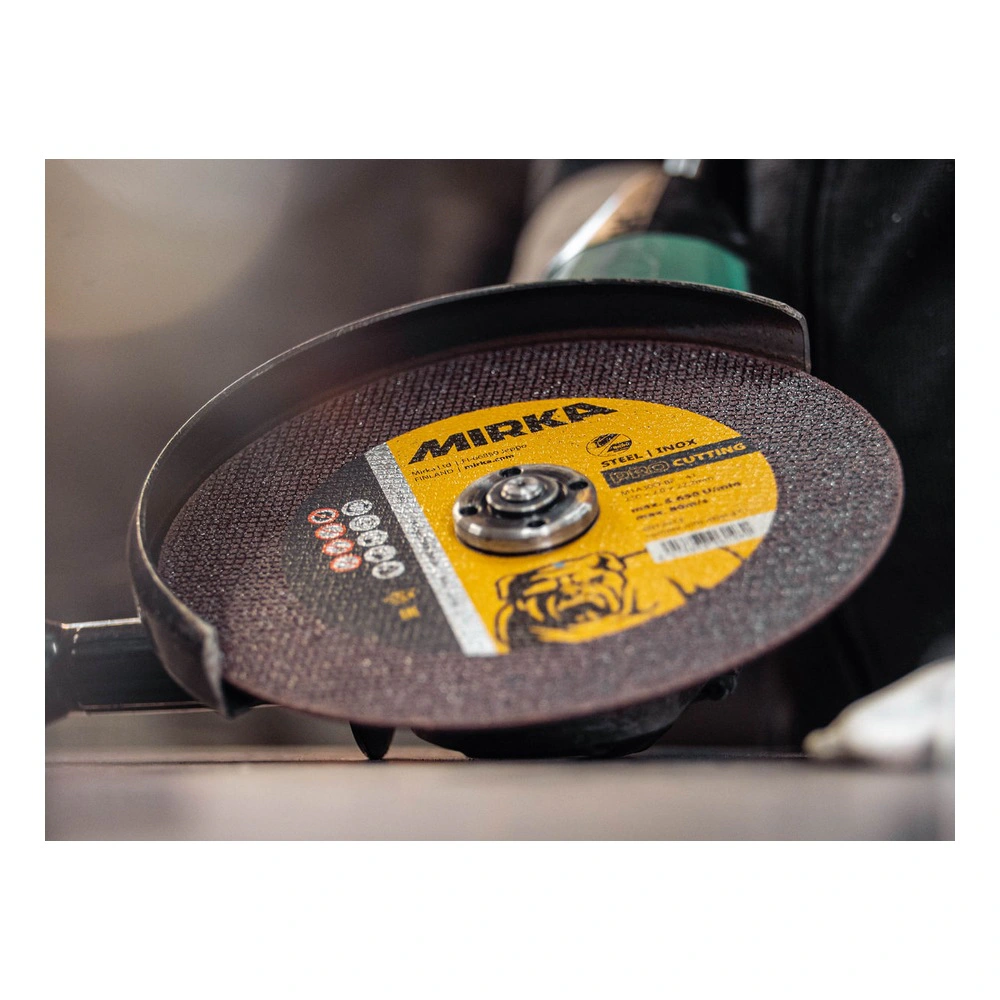 Close-up of cutting disc mounted on grinder