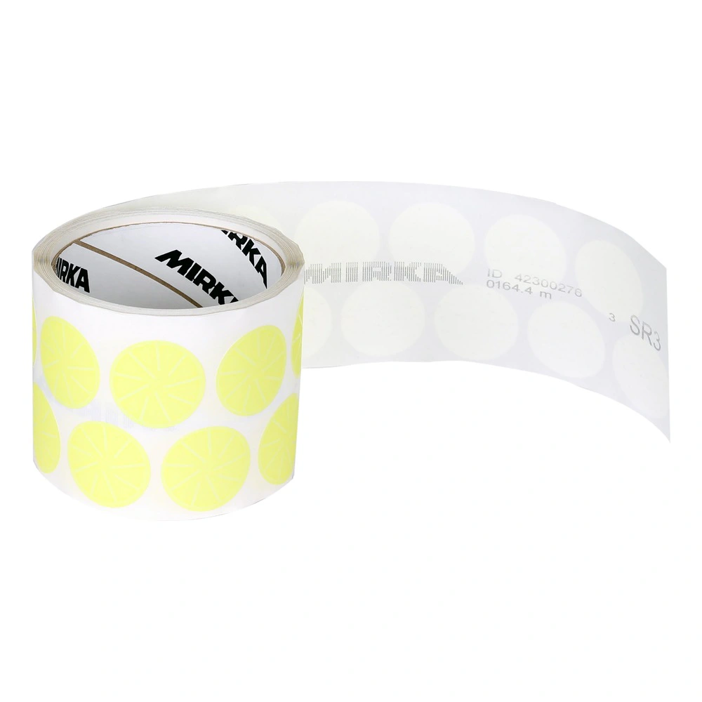 Roll of yellow discs with clear backing sheet